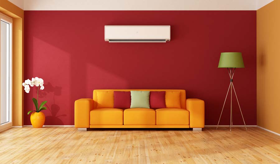 Red and orange living room with colorful sofa and air conditioner - 3D Rendering