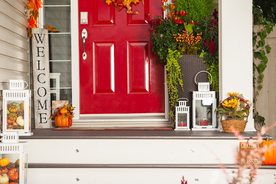 outside of home during fall season reminding homeowners to schedule their fall HVAC maintenance appointment