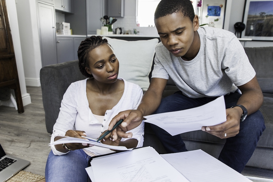 couple looking at bills